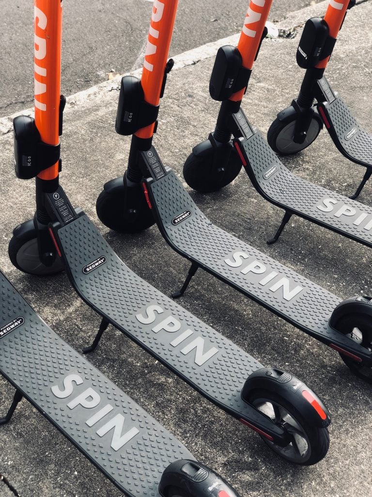 Scooters on sidewalk