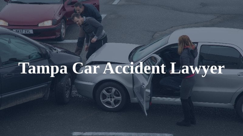 a car accident with drivers inspecting the damage with the caption "Tampa Car Accident Lawyer"