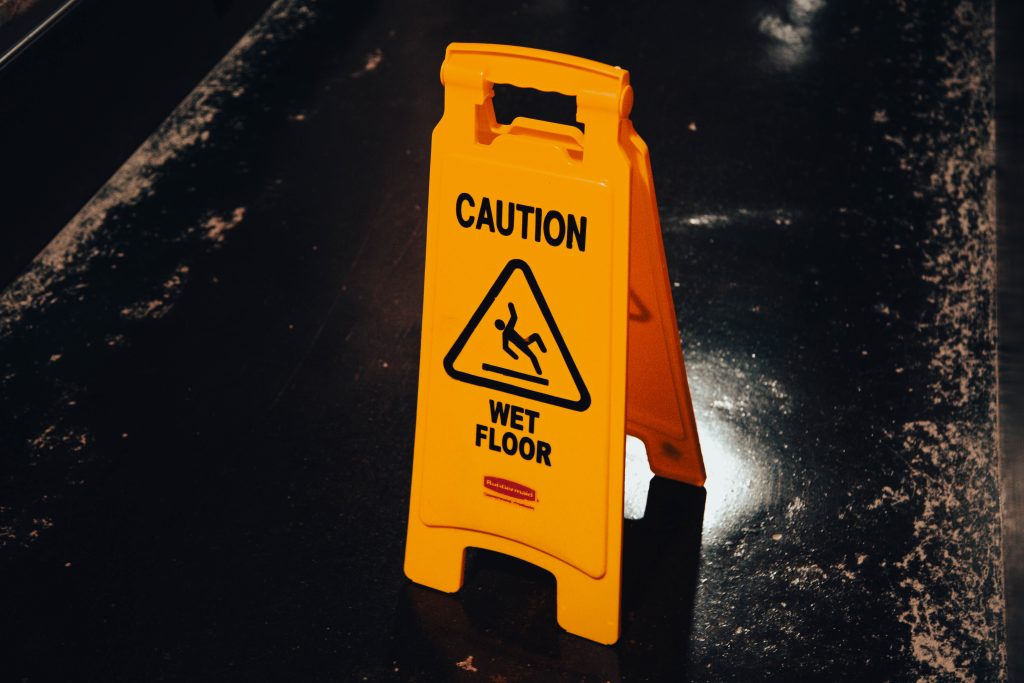 Wet floor sign at tampa premises liability law firm
